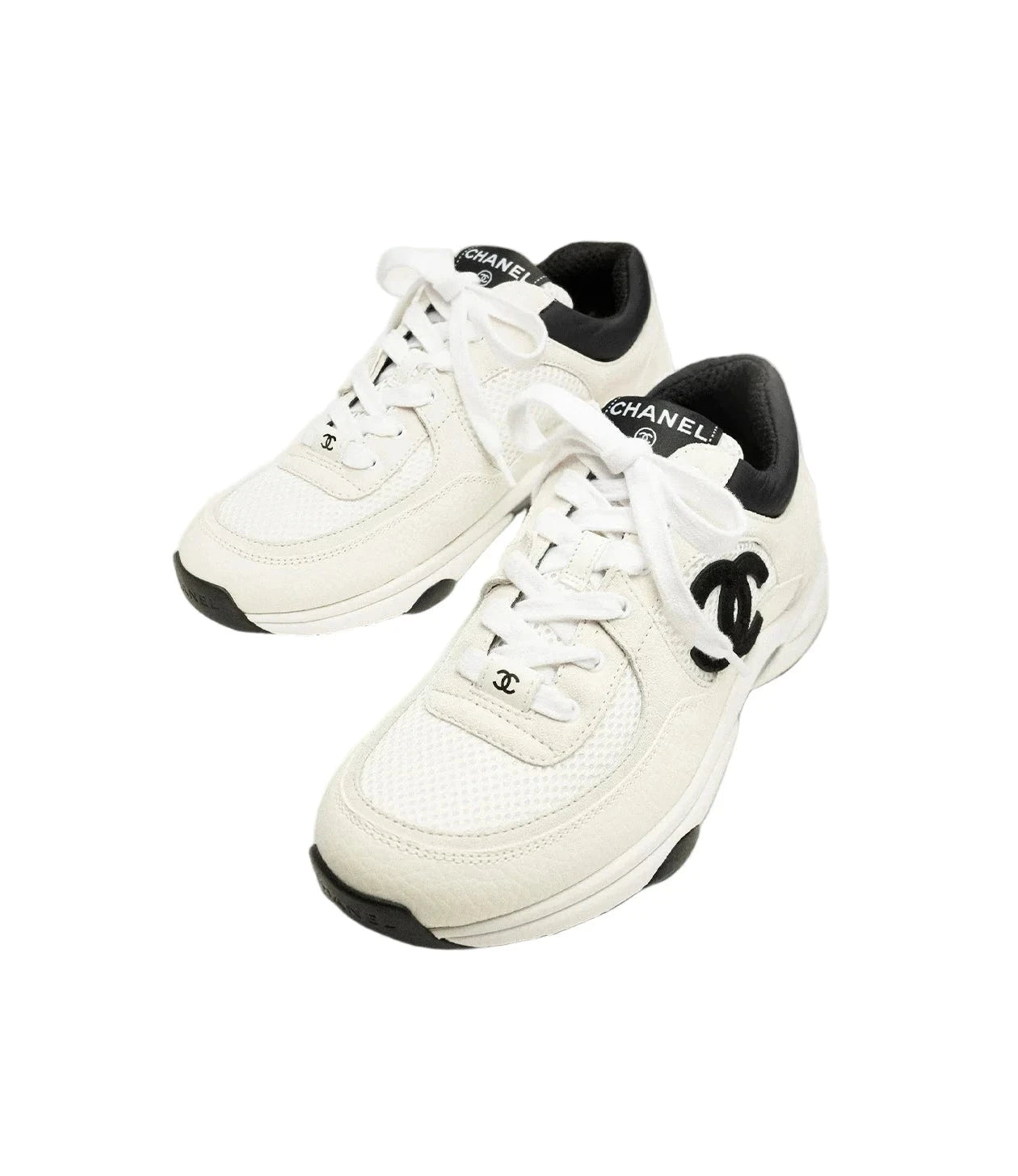 Chanel Mesh, Suede & Calfskin Sneakers
White & Black